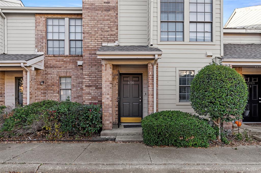 ** Multiple Offers- Please submit Highest and Best by Dec. 20th- 6pm** Open and spacious 2 story townhome style condo with an abundance of light, dual primary suites, and a large and private fenced in patio. This condo has a desirable roommate floor plan with both bedrooms upstairs featuring private en-suite baths and walk-in closets. NO CARPET! Half bath downstairs is great for guests, and a true wood burning fireplace anchored around the open living and dining spaces makes this a cozy home with ample space to entertain or relax for the upcoming season. 2 assigned covered parking spaces are included with washer and dryer conveniently located next to the kitchen. Great community with access to community pool, walking trails and quick access to 635, DNT, PGBT and I35. In a prime location just minutes away from Brookhaven Country Club, Addison restaurants and shopping, nightlight and entertainment, come see what this unit has to offer!