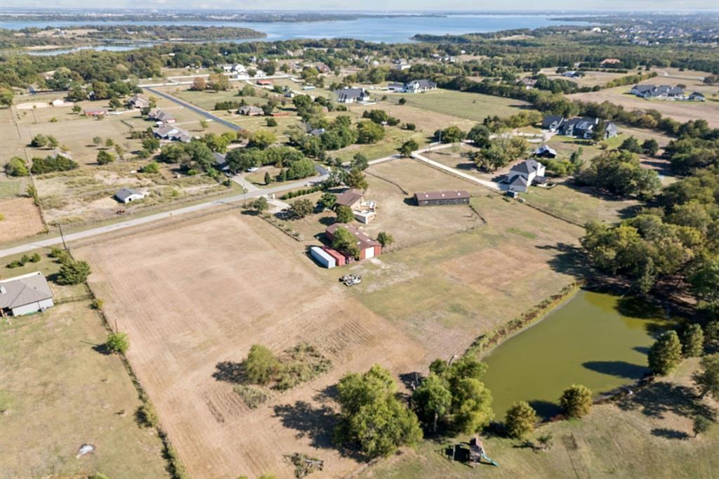 Prime 2.1-Acre Homesite in Lucas, Texas

Discover a rare opportunity to own 2.1 acres of open, build-ready land in the highly sought-after community of Lovejoy ISD. This expansive property offers the perfect canvas to design and build your custom dream home, private retreat, or small-scale ranch with plenty of room for a pool, garden, workshop, or horses.

The land is surrounded by established properties and offers the tranquility of country living without the restrictions of an HOA. Whether you’re envisioning a luxury estate or a peaceful homestead, this property provides the flexibility and freedom to bring your vision to life.

For those seeking even more space, an adjoining 3.75 acre property featuring a home in need of renovation and two steel-framed barns is also available for purchase offering the chance to create a sprawling 5.8 +acre estate  ( MLS - 21086434) 

Enjoy the best of both worlds: serene rural surroundings with easy access to shopping, dining, major highways and  top-rated Lovejoy ISD schools,
