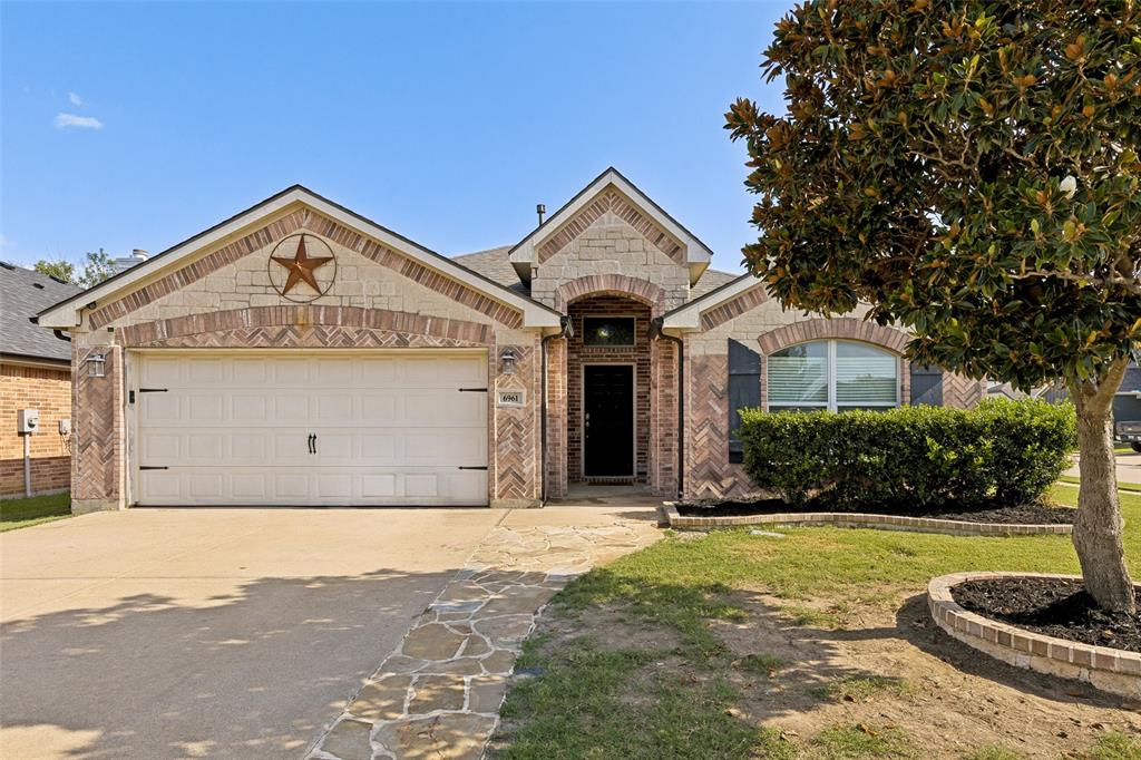 Move-In Ready Corner Lot Gem in the Ranch at Eagle Mountain! Step inside and immediately feel at home in this 3-bedroom 2 bath open layout. Enjoy your large eat-in kitchen complete with island, large pantry, and built in desk. The primary suite boasts with walk in closet, dual sink vanity, and plenty of space for the king size bed! Laundry room has been updated with plenty of storage, and don't forget to check out your 2.5 car garage! Calling all cowboys fans, step inside your garage with epoxy floor and custom paint job! The exterior is just as impressive, with gorgeous curb appeal corner lot providing generous outdoor space perfect for relaxing, entertaining, gardening, or creating the backyard of your dreams. The roof was just repaired July 2026, and the water heater replaced in 2023. Whether you envision weekend barbecues, a play area for the kids, or a peaceful garden retreat, the space and potential are right here waiting for you. Located in the Ranch at Eagle Mountain community, residents enjoy a wonderful sense of neighborhood charm and community in a setting that combines the warmth of residential living with convenient access to the area's best amenities, shopping, dining, and recreation. This is a rare opportunity to own a fantastic corner lot property in a sought-after community at a great value — and opportunities like this don't stay on the market for long. Don't wait, come experience everything this wonderful home has to offer. Your next chapter starts right here at Ranch at Eagle Mountain!