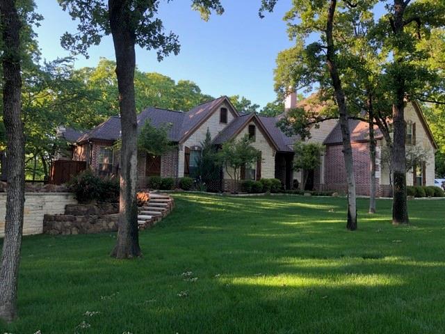 This custom-designed, well-built home left no stone unturned.  It features three spacious bedrooms with private baths, walk-in closets, and abundant built-ins.  The master bath has a walk-in shower with double heads, a corner tub, jewelry cabinets, and a spacious closet system with seasonal racks.  The Island kitchen boasts granite countertops, double-oven, 42-in cabinets, under-mount lighting, and a separate built-in ice maker. This home offers open views from living, dining, and kitchen. Bonus room leads into Utility room with more storage. All bedrooms are spacious with Split bedroom arrangement.  Upstairs secluded media room has tract lighting, designer wall sconces. The outside oasis includes an outdoor kitchen, pool, sauna, large covered deck, fireplace, built-in seating, and scenic views. Misting system. Sprinklered. Let’s not talk about the insulated 65x40 workshop that has a separate one bedroom living quarters attached at the rear. RV parking.  All landscaped on 1.4 acres at the end of the street on a cul-de-sac with tall, surrounding trees where you’ll discover nature. This home offers a lot of upgrades.