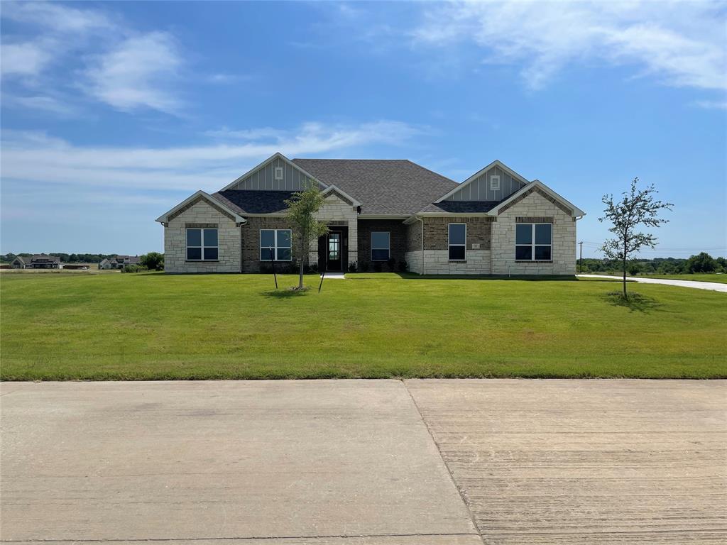 This stunning family home in the Ranch at Stone Hills welcomes you with warmth, space, and timeless charm. Thoughtfully designed, it features 4 spacious bedrooms, 3.5 bathrooms, a private study, an inviting game room, and a generous 3-car garage-offering both comfort and flexibility for everyday living. At the heart of the home, the kitchen is truly a showstopper. An enormous island with elegant waterfall granite countertops anchors the space, complemented by a massive walk-in pantry and abundant room for gathering , cooking, and entertaining with ease. The open-concept family room is filled with natural light and centered around a cozy fireplace, creating the perfect setting for relaxing evenings and memorable moments with loved ones. The primary suite is a peaceful escape. highlighted by a luxurious, spa-inspired bathroom featuring a freestanding soaking tub, refined finishes, and a calming atmosphere designed for unwinding at the end of the day. Set on the expansive 1.119 acre homesite, the outdoor space invites you to slow down and savor the beauty of your surroundings.  Continued...See Addendum Property Description 1