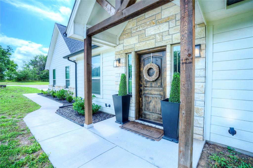 Welcome to your peaceful slice of Texas living in growing Springtown! Situated on a beautifully maintained 1-acre lot, this spacious 3-bedroom, 2-bath home offers the perfect blend of comfort, charm, and room to grow.

This well-maintained, like-new home features an open floor plan designed for both everyday living and entertaining. The bright and inviting living spaces flow seamlessly into the kitchen and dining areas, creating a warm and functional atmosphere for family and guests alike.

Enjoy the freedom and versatility of a full acre with plenty of room for outdoor living, recreation, gardening, or future additions. The expansive property provides privacy, space, and endless possibilities.

If you’re looking for a move-in-ready home with modern comfort, spacious living, and country charm, this property is a must-see!