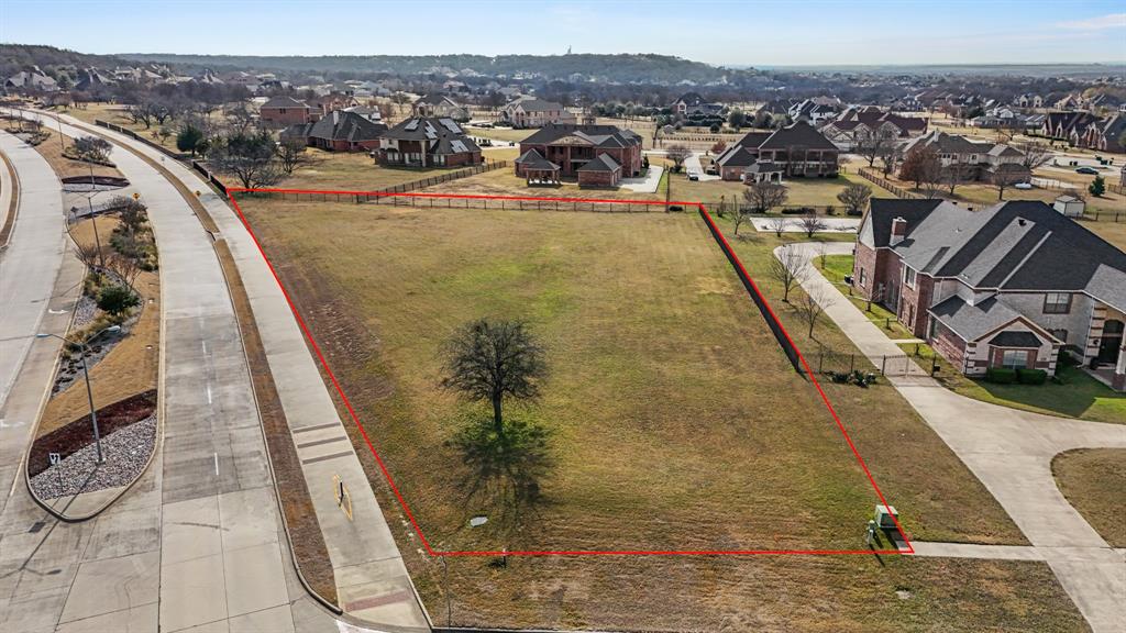 Bring Your Vision to Life in Prestigious Lake Ridge! Discover the perfect canvas for your custom dream home on this beautiful 1.36-acre flat, cleared lot nestled in the highly sought-after Lake Ridge community of Cedar Hill. This ready-to-build homesite offers an easy build with mostly level terrain, plus existing fencing along the back and one side, a great head start for privacy and planning.

Enjoy the feel of a quiet neighborhood surrounded by natural beauty, while staying close to everything you need. Spend weekends at Joe Pool Lake, launch from Lynn Creek Marina, or tee off at Tangle Ridge Golf Course. The community features parks, playgrounds, and sports fields, making it ideal for both relaxation and recreation. With quick access to Hwy 67, you’re minutes from shopping, dining, scenic trails at Cedar Hill State Park and Cedar Ridge Preserve, and just a short drive to Downtown Dallas.

This is your opportunity to build exactly what you want, where you want. All offers welcome!