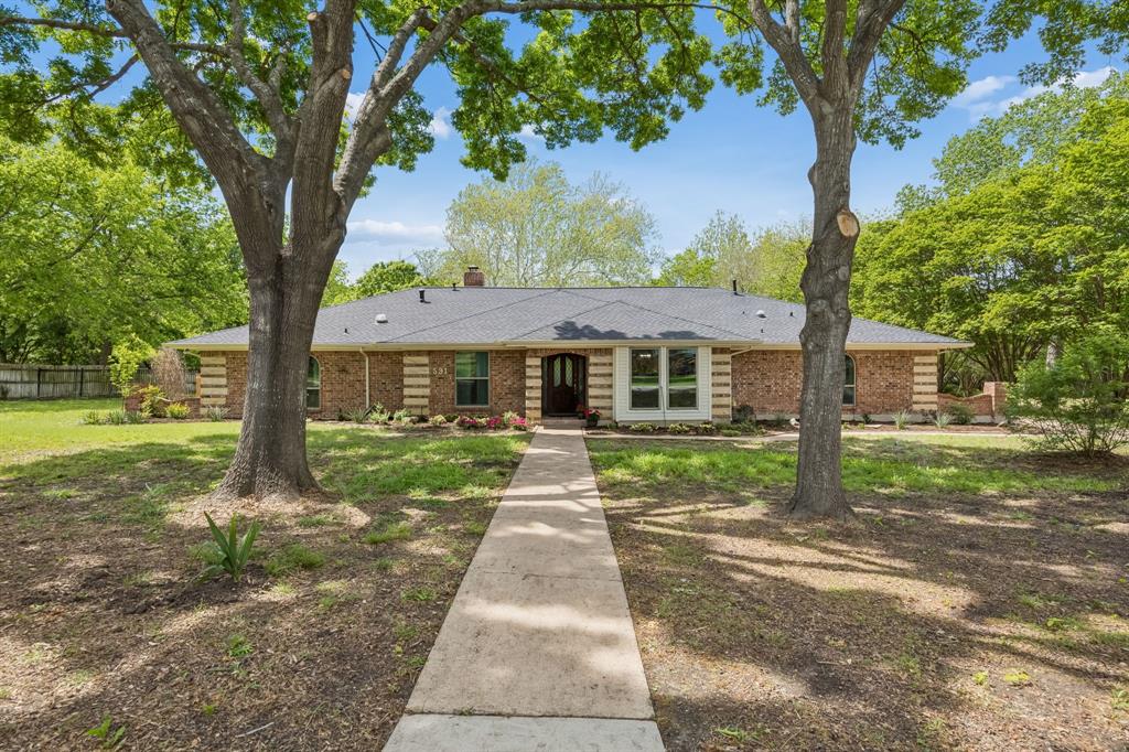 RARE OPPORTUNITY! ONE ACRE * WOODED CREEK LOT * POOL & SPA * NO HOA 
This one-story gem is located in Ranchette Estates, a coveted neighborhood in the Town of Fairview. Fairview offers a small-town atmosphere yet boasts easy access to big-city amenities and major highways. The functional floorplan includes 4 bedrooms, 3 full baths, 2 living and 2 dining areas. Contributing to the charm & character of this home are features such as wood beams & a stunning stone fireplace wall in the family room, a wood-burning stove in the den, beadboard ceiling in the kitchen, French doors in the dining room, and built-in shelves & cabinets throughout. The eat-in kitchen boasts granite countertops, SS appliances and ample cupboard & counter space. The primary suite is large enough for king-size furniture, has an ensuite bath, walk-in closet and access to the outdoors. The cozy den is perfect for family time, game nights or entertaining friends. The expansive backyard is the crown jewel of this home. Enjoy the lush wooded backdrop, relax on the covered patio, cool off in the sparkling pool, cozy up around the firepit, or sit quietly by the creek. A generous workshop with electric power will delight the hobbyist & provide storage space for lawn equipment, toys and tools. The attached covered carport has room for 3 cars & the extended driveway provides space for larger vehicles. Experience the peace, privacy, charm & beauty this home has to offer as well as the convenience of a location just minutes away from shopping, dining, professional services, medical facilities, Hwy 75, Hwy 121 & Hwy 5.