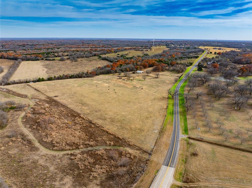 144 acres consists of two tracts: Parcel 1 being 93 acres Parcel 2 being 53 acres. Tract 1 has approximately 1786 feet of frontage along FM 660. Northern property line runs along Red Oak Creek approximately 4700 feet to the east. The most southern section of the tract is out of the flood plain providing approximately 7 acres for building site. The remaining acreage is ideal for cattle or hay production. 
Tract 2 is completely out of the flood plain providing 53 acres of versatile use. Beautiful views of downtown Dallas and skyline.