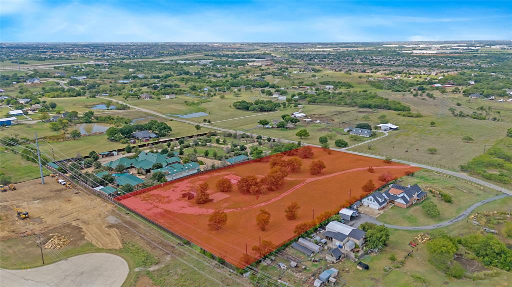 Welcome to a truly rare offering — a stunning 4.7+ acre parcel of land where your dream custom home can become a reality. Nestled in a serene and private setting, this picturesque property offers the perfect blend of natural beauty, space, and possibility. Imagine waking up to expansive views, peaceful surroundings, and the freedom to design a home that reflects your unique vision and lifestyle. Whether you envision a modern farmhouse, luxurious estate, or a charming country retreat, the options are endless. This generous lot offers ample space for outdoor amenities such as a pool, guest house, gardens, or even equestrian facilities — all while maintaining a sense of seclusion and tranquility. With its gentle topography and mature trees, the land provides an ideal canvas for creating your perfect sanctuary. Conveniently located in between both Dallas & Fort Worth. Come and enjoy the best of both worlds: a quiet, rural setting with easy access to modern conveniences, schools, and commuter routes. Don't miss this rare chance to invest in land, lifestyle, and legacy. Opportunities like this don't come often.