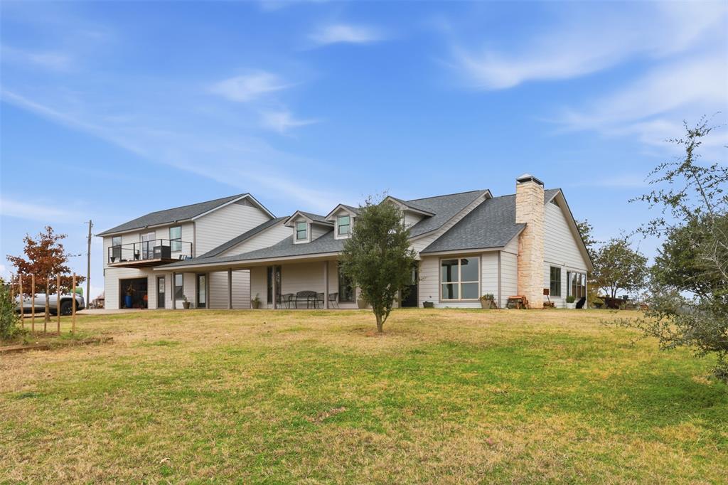 This spacious 3-bedroom, 2 bath Farm and Ranch home is for sale! The main home is approximately 2015 sf, with a large front porch and back patio. An additional flex room could serve as an office, exercise room or an additional bedroom. A sunroom provides even more space for plant lovers or for a dining room. The home has been refreshed with new windows, siding and paint in 2024. This home sits on 10.3 acres, with exceptional views of its surroundings. Additional acreage surrounding the home is available for purchase! A full-size 2-bed, 1 bath apartment with two balconies sits on top of the garage!