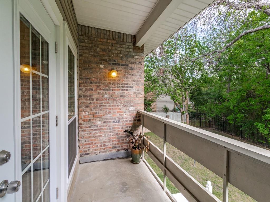 Priced to sell! Location, value, and convenience come together in this move-in ready townhome-style condo located on the second floor in the heart of the Lake Highlands area. This 2 bedroom, 2.5 bath home places you just minutes from premier shopping, dining, and entertainment.  Step into a bright, open living space featuring luxury vinyl plank flooring and abundant natural light. Double doors lead to a private balcony with peaceful treetop views—perfect for relaxing. The kitchen showcases quartz countertops, plenty of cabinets, and a decorative tile backsplash. The spacious primary suite offers beautiful tree-lined views and double closets, while the secondary bedroom includes its own private exterior entrance—ideal for added flexibility.  Enjoy being just steps from the community pool and minutes from I-635, NorthPark Center, and Lake Highlands Town Center. Both HVAC units were recently replaced. HOA includes water, sewer, and trash. Experience East Dallas convenience with a welcoming neighborhood feel in a highly desirable location.
