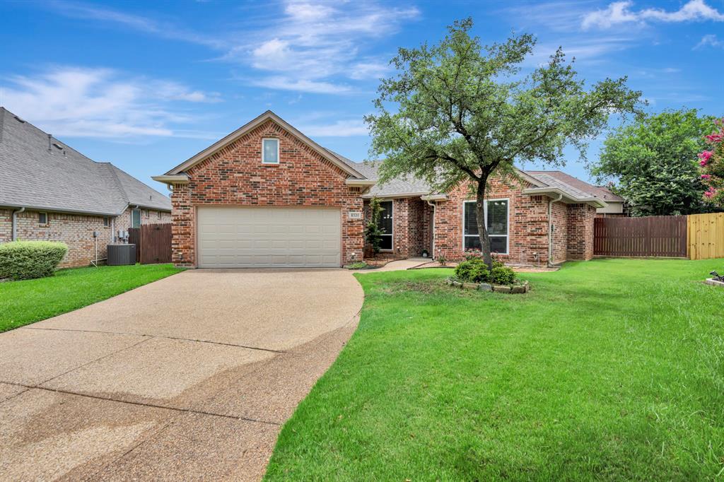 Back on the market because the previous buyer realized they simply needed a larger home! This beautiful home previously attracted multiple offers, and now you have a rare second chance to make it yours. Their change of plans could be your perfect opportunity. Welcome to a low maintenance lifestyle in this gated Arlington community where comfort, convenience, and exceptional amenities come together. Inside, hardwood floors flow through the main living areas, creating a warm and inviting atmosphere. The spacious primary suite is designed for relaxation with elegant crown molding, a sitting area, and a large walkthrough closet with abundant storage. The ensuite bath features dual vanities, a jetted tub, and a separate shower, creating the perfect retreat at the end of the day. The thoughtfully designed kitchen offers a large breakfast bar, a window with a pleasant view, a pantry, and extensive cabinet space for all your storage needs. The living room is the ideal place to gather with family and friends, highlighted by a cozy gas log fireplace. Outside, the oversized backyard provides plenty of space for gardening, pets, play, or simply enjoying the outdoors. The HOA covers all lawn maintenance, giving you more time to enjoy the community pool and the security of gated access. Conveniently located with easy access to Arlington, Fort Worth, and Dallas, this home places shopping, dining, entertainment, and major employers within easy reach. Don't miss your opportunity to call this beautiful home your own—schedule your private showing today!
