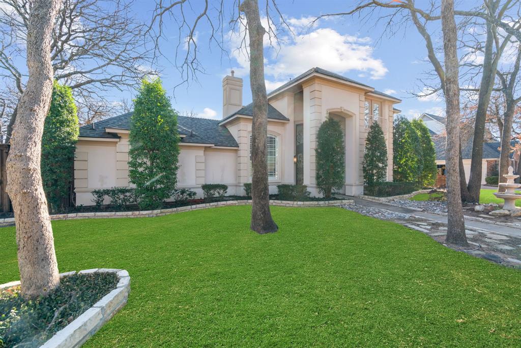Step into this stunning custom home that feels fresh, refined, modern and designed for easy, elevated living. Set on a corner lot in the tree-lined Forrestridge neighborhood, this luxury residence invites you to enjoy mornings filled with natural light, afternoons by the pool, and evenings made for gathering with the people you love.

Inside, the home has been thoughtfully refreshed with new paint, updated bathrooms, refinished wood floors throughout (no carpet), LED recessed lighting, new counters, a new backsplash, and freshly painted cabinetry—creating a clean, modern backdrop for everyday life. The open living, kitchen, and breakfast spaces flow effortlessly together, all overlooking the resort-style pool and patio, making entertaining feel seamless and relaxed.

The kitchen is built for connection, featuring double ovens, a new cooktop, a built-in KitchenAid refrigerator, a generous island, and a walk-in pantry—perfect for everything from quiet mornings to hosting friends and family. The private primary suite offers a peaceful retreat, complete with a fully renovated spa-style bath, while all bathrooms throughout the home have been beautifully updated for a cohesive, polished feel.

A downstairs bedroom and full bath near the garage and patio provide flexibility for guests, extended family, or a home office. Upstairs, a second living area, media room, and two oversized bedrooms create space for everyone to spread out and unwind.

Outside, life slows down in the best way. Enjoy a heated pool, outdoor shower, newer fencing, fresh sod, and Jellyfish lighting that sets the mood for evenings under the stars. Smart lighting, updated fixtures, a newer HVAC system, and a newer iron entry door add comfort and confidence to daily living.

Located close to schools, Eureka Park, shopping, and I-35—and perfectly positioned between Denton and Fort Worth—this home offers the kind of lifestyle that feels both peaceful and connected. Lender incentives available.