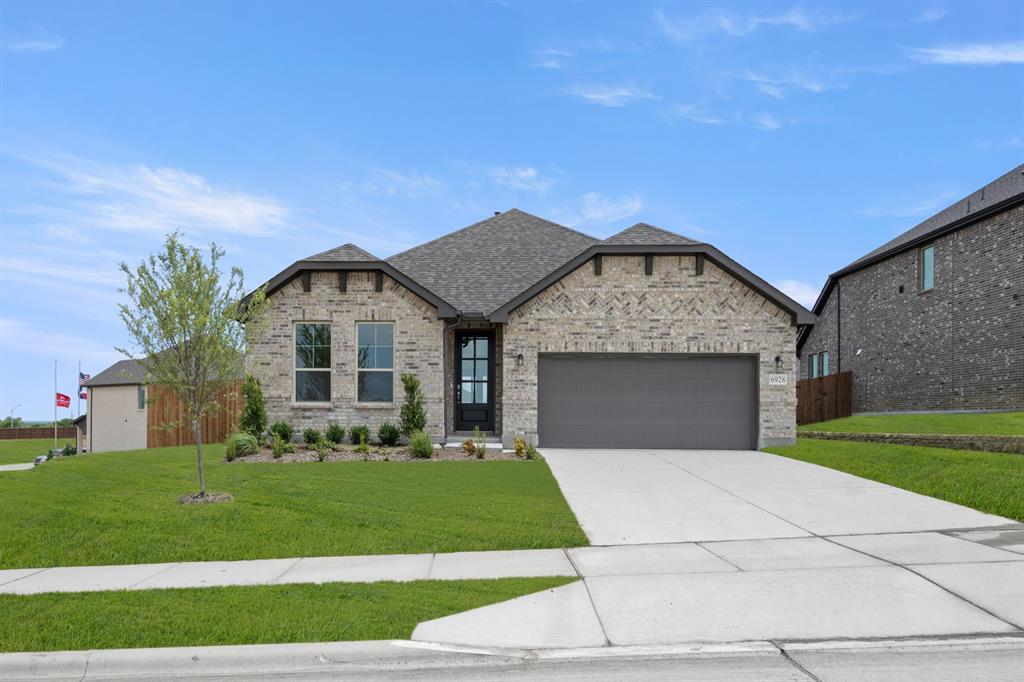MLS# 21173278 - Built by HistoryMaker Homes - Ready Now! ~ ****Choose your rate with up to $30,000 to spend your way**. Designed for comfort and everyday ease, this single-story 3-bedroom, 2-bath home offers a wide, welcoming entry that sets the tone the moment you step inside. The heart of the home features a beautifully upgraded kitchen with quartz countertops and canvas cabinets. Durable LVP flooring flows through all main living areas, creating a clean, cohesive look. The private primary suite is a true retreat with dual sinks, and a walk-in shower. Located in Rocky Creek Crossings, enjoy amenity center with pool, playground, and walking trails, and a peaceful, tucked-away feel with quick access to Chisholm Trail, Hwy 183, I-20, Benbrook Lake, and just 15 minutes from downtown Fort Worth and Clearfork. Built by a trusted, family-owned homebuilder with over 75 years of experience and backed by an above-industry average 10-year warranty—this is a home you can feel confident investing in.**