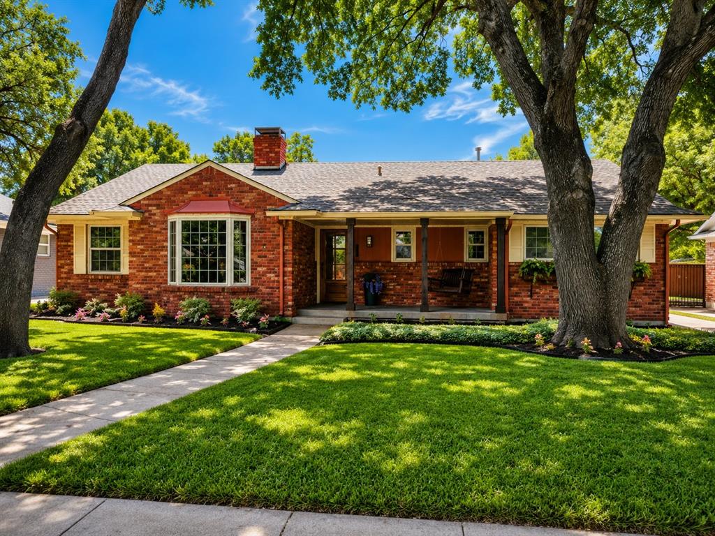 Welcome to one of the largest homes in the neighborhood, completely reimagined from top to bottom! This stunning residence on a generous quarter-acre lot has been meticulously renovated with luxury finishes & designer touches throughout. From the moment you arrive, the curb appeal commands attention with a lush manicured lawn, mature trees, a private electric gate, and a 2-bay garage.

Step inside to discover an open, light-filled floor plan wrapped in warm woods and rich, inviting tones. If you're tired of the all-gray everything trend, you'll appreciate the intentional warmth this home brings to every room. The chef's kitchen features quartz countertops, custom cabinetry, professional-grade appliances, & brushed gold hardware throughout, perfect for entertaining and everyday living. The spacious living room and separate family room flow seamlessly together, highlighted by refinished hardwood floors and designer lighting that complement the home's warm, cohesive palette. A bonus flex space offers the perfect setup for a game room, home office, or whatever fits your lifestyle.

Retreat to the primary suite, complete with a spa-inspired ensuite bath featuring a luxury shower, dual sinks, and designer finishes that elevate the morning routine. Two additional bedrooms and two and a half updated baths carry the same warmth and quality throughout. Every inch of this home reflects quality craftsmanship and thoughtful design.

The renovation goes beyond what you can see. The entire plumbing system under the home has been replaced, giving buyers the confidence and peace of mind.

Outside, a charming pergola anchors the backyard, surrounded by lush grass and mature trees, creating a private retreat ideal for Texas entertaining. All of this on a quiet street with no HOA, just minutes from White Rock Lake, Lakewood, Abrams Road dining and shopping, and major commuter routes.

This is not your average renovation. Come experience the difference at 7048 Arboreal Drive.