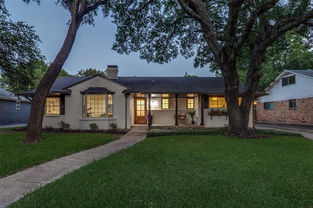 Welcome to one of the largest homes in the neighborhood, completely reimagined from top to bottom! This stunning residence on a generous quarter-acre lot has been meticulously renovated with luxury finishes & designer touches throughout. From the moment you arrive, the curb appeal commands attention with a lush manicured lawn, mature trees, a private electric gate, and a 2-bay garage.

Step inside to discover an open, light-filled floor plan wrapped in warm woods and rich, inviting tones. If you're tired of the all-gray everything trend, you'll appreciate the intentional warmth this home brings to every room. The chef's kitchen features quartz countertops, custom cabinetry, professional-grade appliances, & brushed gold hardware throughout, perfect for entertaining and everyday living. The spacious living room and separate family room flow seamlessly together, highlighted by refinished hardwood floors and designer lighting that complement the home's warm, cohesive palette. A bonus flex space offers the perfect setup for a game room, home office, or whatever fits your lifestyle.

Retreat to the primary suite, complete with a spa-inspired ensuite bath featuring a luxury shower, dual sinks, and designer finishes that elevate the morning routine. Two additional bedrooms and two and a half updated baths carry the same warmth and quality throughout. Every inch of this home reflects quality craftsmanship and thoughtful design.

The renovation goes beyond what you can see. The entire plumbing system under the home has been replaced, giving buyers the confidence and peace of mind.

Outside, a charming pergola anchors the backyard, surrounded by lush grass and mature trees, creating a private retreat ideal for Texas entertaining. All of this on a quiet street with no HOA, just minutes from White Rock Lake, Lakewood, Abrams Road dining and shopping, and major commuter routes.

This is not your average renovation. Come experience the difference at 7048 Arboreal Drive.