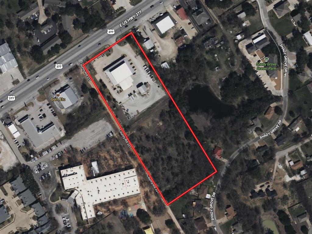 This versatile commercial property offers excellent visibility and space along one of Granbury’s busiest corridors. The main building provides 9,975 square feet of heated and cooled space, including two half baths, and is thoughtfully laid out to accommodate a wide range of uses. The front portion measures 93' x 76', while the back portion spans 61.2' x 47.5', giving you flexibility for showroom, office, or retail operations. Behind the main building, you’ll find a 900-square-foot shed, perfect for additional storage or workspace. The property sits on 2.994 acres, offering ample parking and outdoor space, with an additional 3.218-acre vacant lot included, providing room for future expansion, development, or investment opportunities. Located directly on Hwy 377, this property delivers high traffic counts and unbeatable accessibility. Whether you’re looking to expand your existing business or invest in a strategic commercial holding, this property is ready to meet your needs.