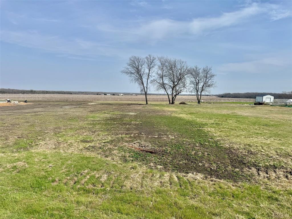 Beautiful, flat, a perfect rectangular lot with 155.57' of road frontage. Very minimal restrictions. It will require aerobic septic. For a new water meter contact SGSUD. Electricity available at the road. No time limit to build.Owner financing available, 20% down, 10-15Y note.