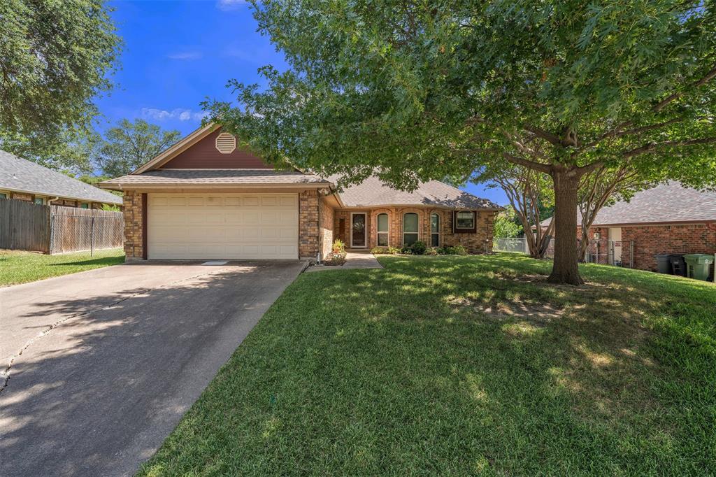 Pride of ownership shines throughout this lovingly maintained, one-owner home that's ready for its next chapter! Nestled beneath mature shade trees in an established North Richland Hills neighborhood, this home offers the kind of quality care that's becoming increasingly rare. While ready for cosmetic updates, its nostalgic charm, custom millwork, rich wood accents, and timeless character create the perfect canvas for your personal vision. 
The spacious living room is filled with warmth and personality, featuring custom wood paneling, a cozy brick fireplace and unique architectural details you simply don't find in today's homes. The generous primary suite offers plenty of space along with an oversized ensuite bath, while secondary bedrooms provide flexibility for family, guests, or a home office. Step outside to enjoy the beautifully shaded backyard with a large covered patio, expansive brick paver entertaining area, lush lawn, sprinkler system, mature landscaping, and storage shed, creating the perfect setting for relaxing evenings or weekend gatherings. Solidly built and meticulously cared for by the original owner, this home offers an incredible opportunity for buyers looking to add their own style without sacrificing quality, space, or location. Conveniently located near shopping, dining, parks, and major highways, this is a rare chance to own a home where decades of care are evident from the moment you arrive. ROOF 2019, HVAC and H2O Heater recently replaced.