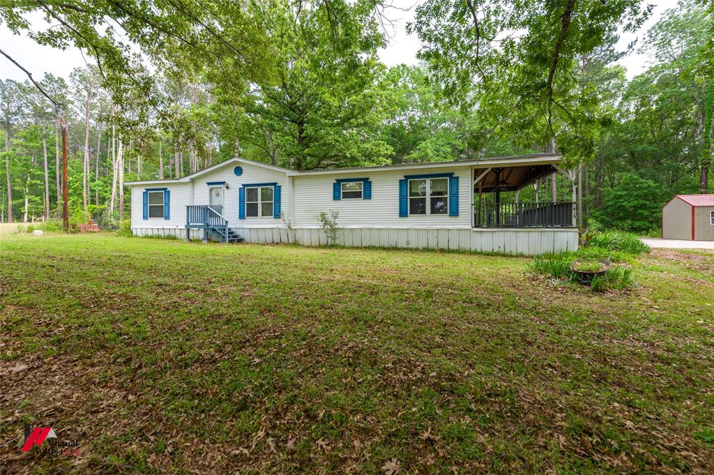 Welcome to 7415 Preston Road in Keithville, Louisiana where space, comfort, and a peaceful setting come together on 1.73 acres.
This 3-bedroom, 2-bathroom home offers approximately 1,682 square feet with an open-concept living area anchored by a cozy fireplace, creating a warm and inviting central space. The eat-in kitchen provides a functional layout with room for both everyday living and casual dining.
The primary suite features an en-suite bathroom complete with a separate tub and shower, offering added comfort and convenience.
Step outside to a large covered deck—ideal for relaxing, entertaining, or simply enjoying the surrounding outdoor space. A storage shed adds extra functionality for tools, equipment, or hobbies.
Situated in Keithville, this property offers a quiet, rural atmosphere with room to spread out, while still being a short drive to Shreveport for shopping, dining, and other amenities. The area is known for its open landscapes and easy access to major roadways, making commuting simple while maintaining a more private setting.
Offering both indoor comfort and outdoor space, this property provides a versatile opportunity for a variety of lifestyles.
