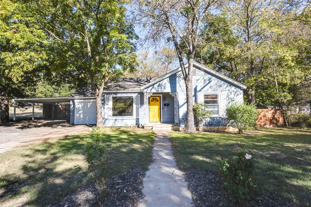 Darling home on a spacious beautiful lot with great yards, awesome fenced pet area, mature beautiful trees, spacious driveway and parking, and fun sitting areas. 2 bedroom 1 bath home has tons of character and many great updates including new appliances, refrigerator, range, microwave, farmhouse sink, tankless water heater, totally remodeled bath, new paint and beautiful hardwood floors throughout. Newer washer and dryer in utility area in back garage. There is a survey.