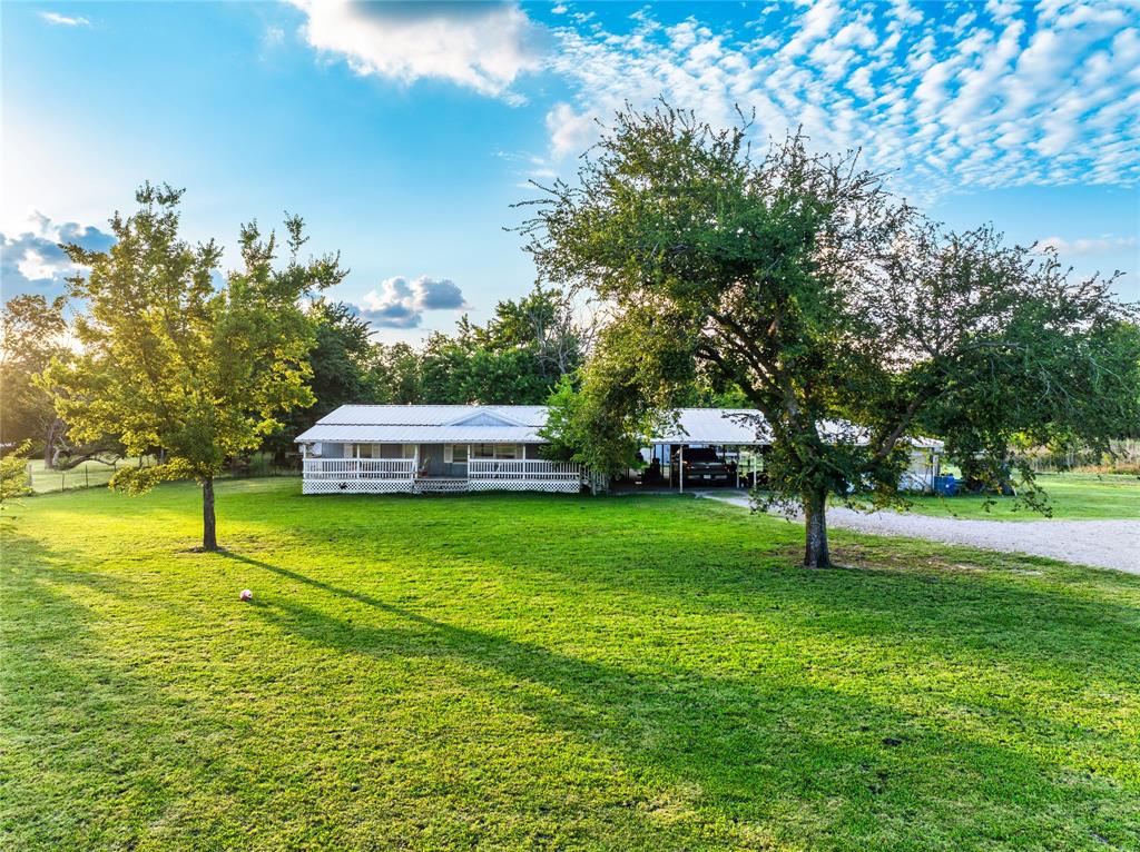 Escape to the peaceful countryside at 5401 Cheryl Ln in Kaufman, Texas! Nestled on 3 beautiful acres, this ranch-style property offers the perfect blend of rural charm and functional living. The fully fenced property features a spacious double-wide manufactured home and is thoughtfully equipped with multiple animal shelters and outbuildings, making it ideal for livestock, horses, hobby farming, or anyone seeking a country lifestyle.
Enjoy the serenity of nature with a picturesque stream flowing along the back of the property, creating a peaceful setting and added character to this unique homestead. With plenty of room for animals, gardening, recreational activities, or future improvements, this property provides endless possibilities.
Whether you’re looking to start a small farm, create a private retreat, or simply enjoy wide-open spaces away from the city, this Kaufman gem offers the opportunity to live the country lifestyle you’ve been dreaming of while still being conveniently located near town amenities.