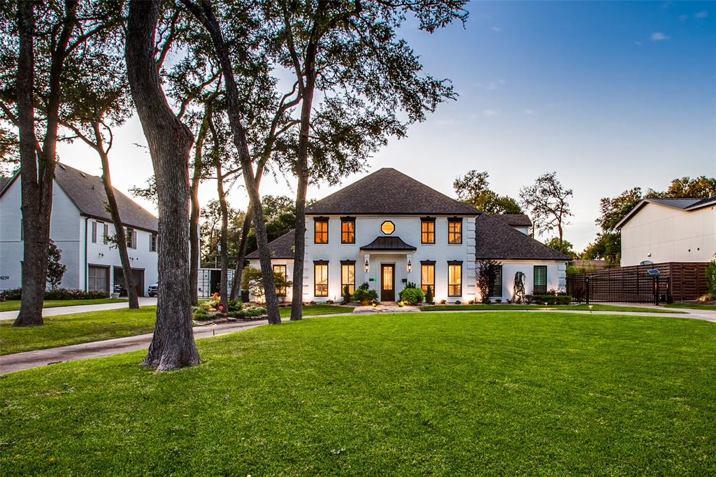 Attention to detail abound in this fully updated & lovingly remodeled Forest Hills home. Estate like setting on almost ½ an acre with beautiful drive-up appeal, towering mature trees, circular drive & elegant electric gate. Timeless traditional style infused with some modern interior finishes. Versatile floor plan, master down, separate office and cool home gym, this property has much to offer & is set up well for entertaining with the open kitchen-living with extended sightlines to the amazing back yard. Featuring an outdoor kitchen, fireplace, heated pool, spa and large grass area.