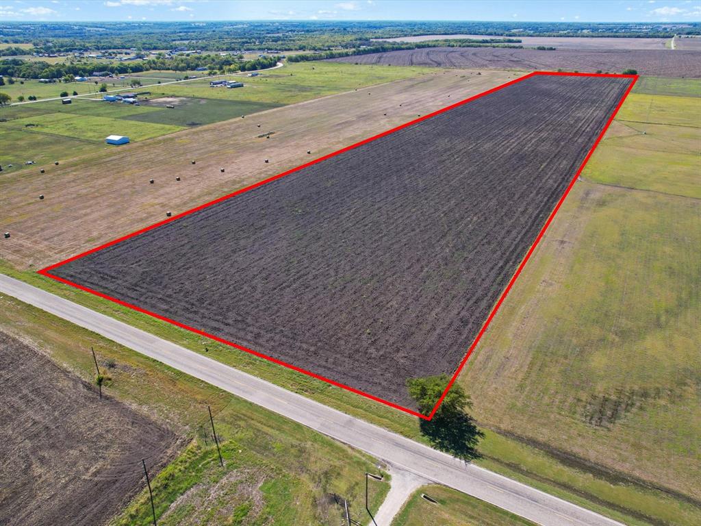 Check out this GREAT opportunity to own this 26-acre tract located on Hwy 697 just east of Sherman, approximately 10 minutes from the Texas Instruments and Globitech Facilities and 30 minutes to McKinney. This property is ready for the future growth and presents excellent development potential to the growing Sherman area. With approximately 450 feet of Hwy. frontage this property currently in row crop production with an Ag-exemption in place is level to gently sloped. Whether you're looking for a buy and hold investment or planning on building your dream home, this property is diamond just waiting to be polished. Come take a look today and make it you're on and experience the tremendous growth opportunities in the Sherman Texas area! Co-op water & electric available at road
