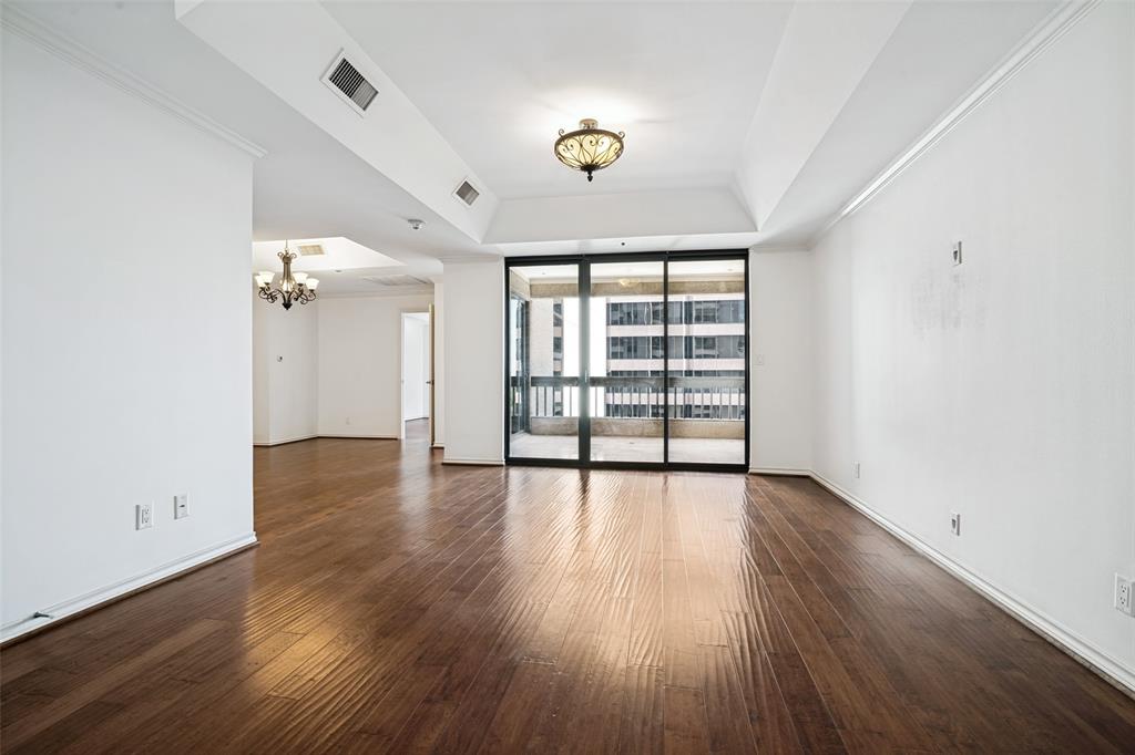 Luxury high-rise condo in Highland Park ISD. Freshly painted 12th floor unit has an open floor plan; two bedrooms with en suite baths and a large balcony with access from the primary suite and the living area! The spacious primary includes a generous bath and walk in custom closet with plenty of shelves. The second bedroom could flex as an office as well. There are two assigned parking spots for Unit 1202 conveniently located directly out the elevator and an oversized storage unit. Updates include: new paint, new AC unit, new dishwasher, new commode, addition of garbage disposal, and Ring doorbell. The Shelton offers a premier location with numerous amenities including valet, concierge, secure gated parking, state of the art fitness center, resort-style heated pool and hot tub, clubhouse, and putting green.  Amazing location in the heart of shopping and dining along with sought-after HPISD. Lock and leave or stay and play.