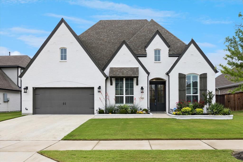 This is a place you can genuinely call home. This stunning, immaculate property showcases a variety of upgrades, including shutters, a whole-home generator to eliminate power outages, enhanced appliances, fashionable hardware, & so much more. The exquisite engineered hardwood floors flow beautifully throughout this spacious 3,202 square-foot ranch-style residence.
Each bedroom features a private bathroom, complemented by a convenient half bath for guests.
The versatile laundry room is perfect for crafting or any hobby you adore. An office filled with natural light, complete with built-in bookshelves, adds to the allure. Additionally, there’s a library outfitted with built-in cabinetry, ready for your personal touch.
This home even boasts a dedicated coffee bar room! When I say it has everything, I truly mean it. Thoughtfully designed with meticulous attention to detail, this property is a must-see. With two air conditioning units, two water heaters, & so much more. 
Imagine savoring your morning coffee, surrounded by lush landscaping that offers both privacy & beauty. The outdoor is also plumbed for a gas grill!
Inside, you’ll discover a gourmet kitchen that will delight any culinary enthusiast, featuring top-of-the-line appliances, ample counter space, and a large island ideal for entertaining. The open-concept living area is designed for comfort and style, with a fireplace that creates a warm and inviting atmosphere.
The master suite serves as a sanctuary, with a sitting area & offering a spa-like bathroom with a soaking tub & a walk-in shower, as well as a spacious walk-in closet that caters to all your storage needs.
Every corner of this home radiates elegance and sophistication, making it the perfect retreat from the hustle and bustle of everyday life. Whether you’re hosting a large gathering or enjoying a quiet evening alone, this home provides an ideal backdrop for all of life’s moments.
It’s not just a house; it’s a space where memories are created.