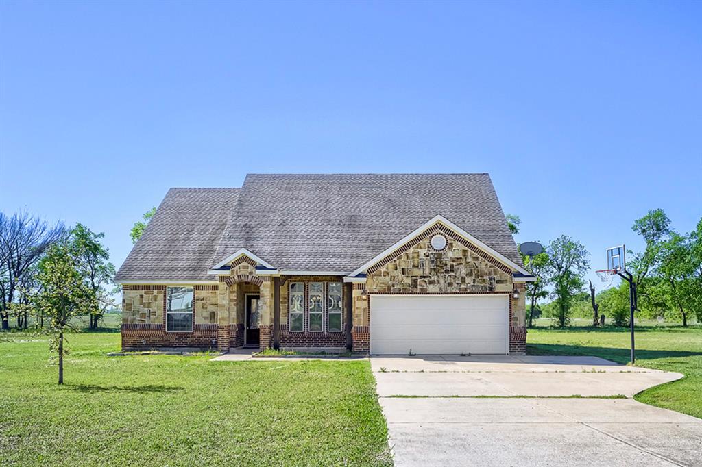 Seller offering up to 2.5% in seller credits to use towards rate buy down or closing costs with preferred lender. Welcome to this charming all-brick home located in the desirable Prairie Crossing Estates subdivision in Howe, Texas. This beautifully maintained 3-bedroom, 2-bath residence sits on a large, level lot and offers both comfort and functionality. Step inside to find hardwood floors throughout the main living area, creating a warm and inviting space that seamlessly opens to the kitchen—perfect for everyday living and entertaining. The thoughtful layout provides a comfortable flow with plenty of natural light. Enjoy outdoor living year-round on the covered back patio, overlooking a spacious backyard with plenty of room for recreation, gardening, or future enhancements. Situated at 98 Sunnydale Court, this property combines peaceful suburban living with convenient access to nearby amenities. Don’t miss your opportunity to own this move-in ready home—schedule your showing today!