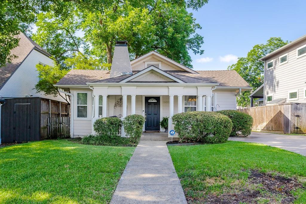 Charming historic home located near the intersection of Belmont and SKillman Avenue. Craftsman bungalow with two bedrooms, one bath, and the bonus of a second living room uncharacteristic for homes of the period.  Gorgeous hardwood floors and crown molding throughout.  Fireplace in formal living room. Kitchen has a breakfast bar and laundry closet. Ceiling fans throughout home.  Tankless hot water heater installed in 2023.  Insulation added in attic in 2024. French doors in the family room open to a deck and generous backyard.  Neat and tidy, unattached single car garage.  Whether you choose to remodel or build your custom dream home, you'll love this location!  Friendly neighborhood is extremely walkable.  Just around the corner from Leila Bakery and Kitchen, Stoney's Wine Bar, and numerous other restaurants.  Also walkable to Lower Greenville and Lakewood hot spots. Easy walk or bike ride to White Rock Lake.  Convenient to Knox Henderson district, Uptown, Downtown and medical district.