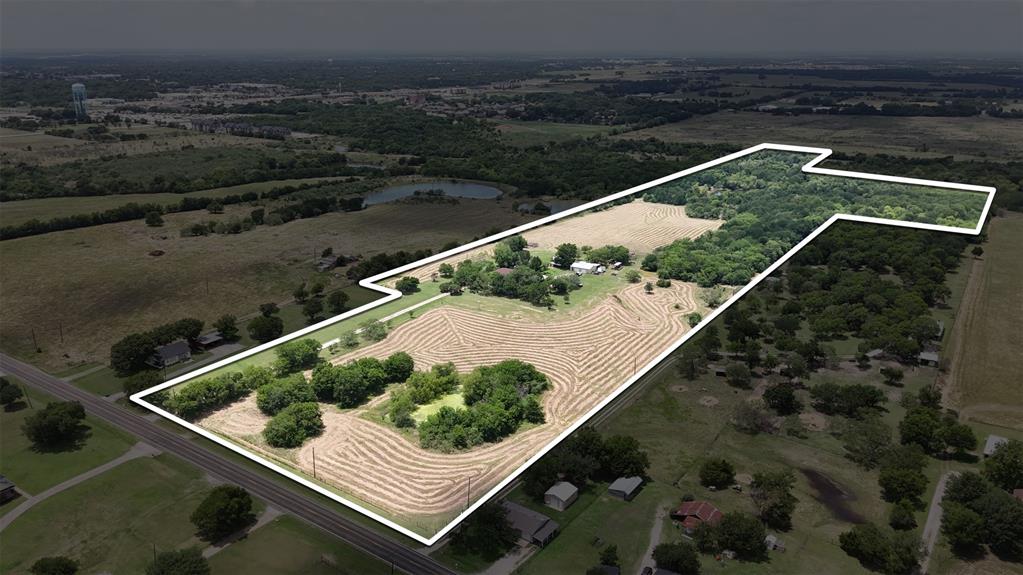 Discover the perfect blend of open space, natural beauty, and endless possibilities with approximately 36 acres located off Creechville Road in Ennis. This beautiful property features multiple ponds, mature trees, a workshop, and a smokehouse, making it ideal for recreation, farming, ranching, or building your dream property. A creek runs along the back of the property, where the current owners have discovered fossils over the years, adding a one-of-a-kind feature for nature enthusiasts and explorers alike. Wildlife is frequently seen throughout the property, creating a peaceful setting for those who enjoy the outdoors. Existing equipment is negotiable with an acceptable offer, providing added value and convenience for the new owner. Looking for even more? The adjacent home and an additional 2 acres are also available for purchase. Contact the listing agent for more information and to discuss purchasing the home with the additional acreage.