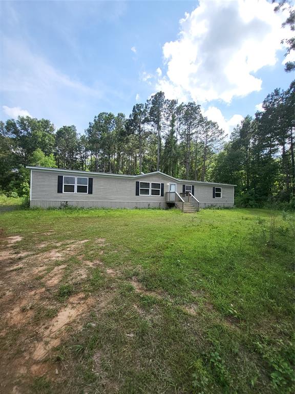 This home COULD be a real diamond in the rough JEWEL.  SERIOUS need for a quick sale.  Just a very few spaces on the inside need a little touch up where the puppy was a puppy and one room needs carpet replaced.  Other than that, wonderful 5 bedroom, 3 full bath open concept home.  Huge utility room and lots of space here.  This is 3 separate lots, side by side for a total of 4.11 acres.  PLEASE MAKE SURE YOU PUT ALL THREE PARCELS ON YOUR OFFER.  Seriously, just a little bit of touch ups and you have a gem.  Home is not even 5 years old.  We are just waiting on the weather. to finish sprucing up the outside.  AGENTS, please read private remarks.  Very Important. Also, please give us grace in the pics!  Selling a home is sometimes chaotic!