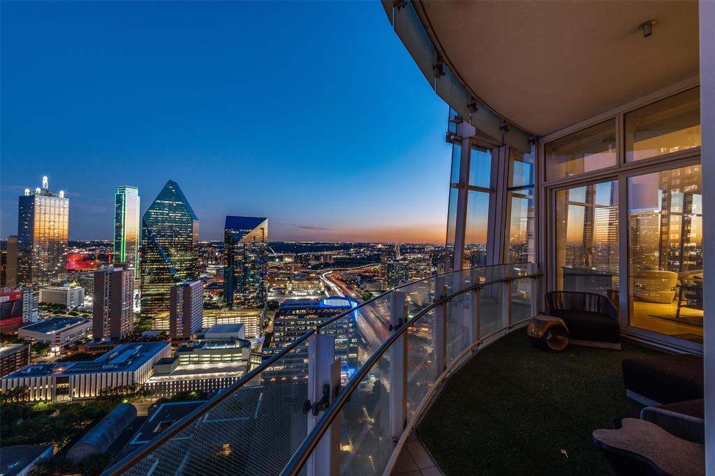 Perched near the top of the iconic Museum Tower, this extraordinary half-floor residence on the 33rd floor offers over 4,800 square feet of refined living space and wrap around terrace with sweeping views of the Dallas skyline. Private elevator access to the home greets you with a dramatic custom glass and brass entry, setting the stage for an unforgettable experience.  

The open-concept floor plan integrates a dining area and two generous living spaces while the rich finishes including 9” European Oak elevate the home's aesthetic. The highly sought after Skyroom with 270 degree views of the southern exposure creates a wonderful living area. Ideal for both grand entertaining and everyday luxury, this 3-bedroom, 3.5-bath condominium features floor-to-ceiling windows with electric Lutron shades that flood the space with natural light and showcase panoramic vistas from every angle. The kitchen includes custom Italian Molteni&C cabinets, generous wine tower, gas cooktop, and personal work station, perfect for both casual dining and family time.  

The oversized primary suite offers a serene retreat with expansive views, spa-inspired bath, terrace access and a custom Molteni&C walk-in closet. Two additional en-suite bedrooms offer privacy and flexibility for guests or a home office. Set within one of Dallas’ most prestigious high-rises, residents enjoy world-class curated services-amenities: 24-7 concierge-valet, house car, 80-foot pool, great lawn, fitness room, saunas, guest suites, dog parks and more. Community activities: happy hours and social events. 3 parking and 2 storage. All just steps from the city's top cultural institutions, restaurants, and Klyde Warren Park.