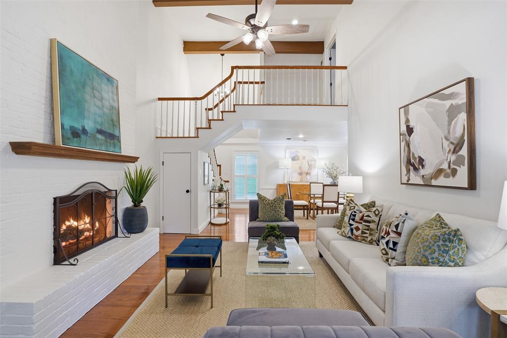 Located within the highly sought-after Overton Park Elementary school zone and nestled on a peaceful, oak-lined street in Overton West, this beautifully family home offers a rare blend of timeless character and everyday comfort. The thoughtfully planned multi-level floor plan creates distinct spaces for entertaining, relaxing, and daily living while maintaining a warm and connected feel throughout the home. The inviting main living area is highlighted by soaring vaulted ceilings and a brick fireplace centerpiece that creates an impressive focal point for gatherings, while an elegant formal dining space is ideal for hosting family dinners and special occasions. A separate den with custom built-in shelving provides exceptional flexibility and serves beautifully as a private study or family den. At the center of the home is the updated kitchen with granite countertops, crisp white cabinetry, and a sleek induction cooktop.  French doors open from the den to an expansive covered patio and create a seamless transition between indoor and outdoor living spaces. On over one third of an acre, the backyard has abundant space for entertaining, outdoor dining, or simply enjoying the natural beauty and privacy. Plenty of room to add a pool! The garage is heated and cooled and the connected mudroom leads to an additional storage room that could be converted back to a wine cellar, or used as an office or craft room. Recent improvements include a 2023 roof, dual Trane HVAC systems installed in 2020, lifetime warranty  Ideally positioned near premier private schools, the Trinity Trails system, shopping, and dining, this special home delivers an outstanding lifestyle opportunity in one of Fort Worth’s most desirable locations. (The photo of a painted brick home with dormers is an AI generated rendering to show potential look). Priced to sell!