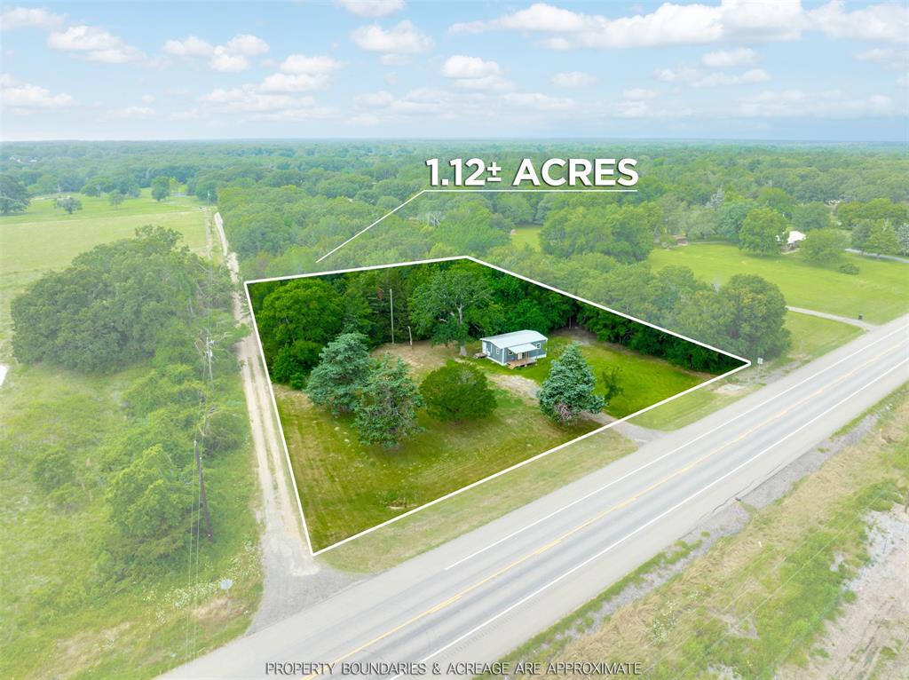 Outside the city limits and full of charm, this darling tiny home on over an acre offers endless possibilities at a price point that’s hard to find! Conveniently located just minutes from the country club and lake, and less than an hour from Broken Bow State Park, this property is ideal as a weekend getaway, short-term rental investment, starter home, or cozy forever home. Enjoy the peace of country living with room to roam, all while staying close to recreation and amenities. Small in size but big on opportunity—priced under $100,000, this one won’t last long!