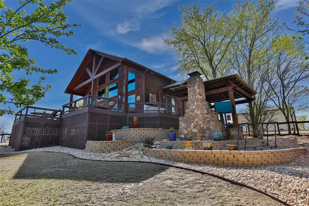 This exceptional lakeview property offers the perfect blend of lifestyle & investment potential. Designed for comfortable full-time living or effortless second-home enjoyment, it delivers the peace, views, and outdoor access that make lake living so desirable. Beyond being a beautiful place to call home, the property has a proven track record as a high-performing short-term rental. Successfully operated as an Airbnb house for multiple years, it boasts an outstanding 4.95 star guest rating, demonstrating consistent demand, strong reviews, & reliable income history. Adding even more value, the property includes an additional barn that presents a unique opportunity for supplemental rental income-whether used for storage rentals, event space, or creative income-producing possibilities (subject to buyer use & local regulations). Whether you're looking for a serene lakeside residence, a turnkey short-term rental, or a hybrid lifestyle-investment property, this home checks every box with location, performance, & future income potential.