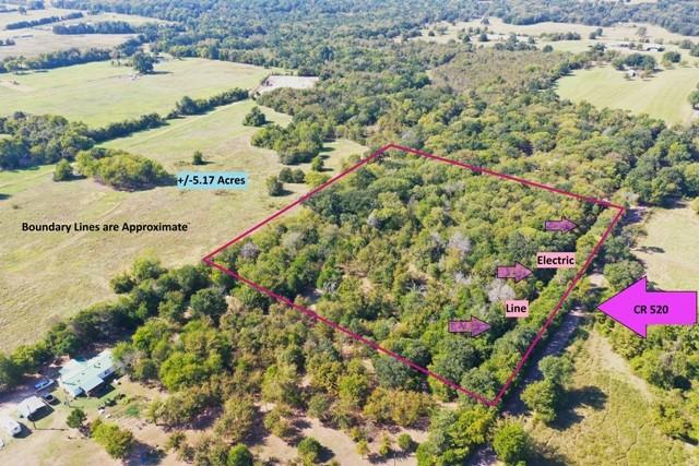 Quiet, Country Living just off of HWY 84 East of Fairfield.  Beautiful trees cover this 5 acre tract with trails already in place.  Enjoy a peaceful walk through the woods as you consider all of the possibilities that this land offers.  Plenty of road frontage on County Road 520 for installing a driveway to your new home.  NO RESTRICTIONS, MOBILE HOMES ARE ALLOWED, back of the property is fenced & there is electricity at the road.  Community water is not available, water well required.  Minutes from shopping, restaurants, and the Freestone County Courthouse Square where there are activies to enjoy year round.  Fairfield is located approximately 90 miles south of DFW and 60 miles east of Waco.  Great location central to all major TX Cities!