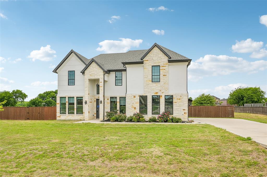 Check out 681 Davenport Dr, featuring a comfortable fireplace that creates an inviting atmosphere. The kitchen is equipped with all stainless steel appliances, an accent backsplash, and a functional island. The primary bedroom includes a walk in closet, while its bathroom contains double sinks and a separate tub and shower for convenience. Outside, a patio extends to a fully fenced in backyard. Experience modern comfort and  design in this inviting residence. Home comes with a 100-Day Home Warranty and a 7-Day Home Test Drive to move in 7 days early for free