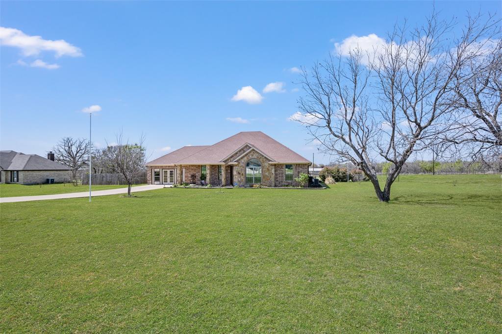 Beautifully maintained 3-bedroom, 2-bath home situated on a full acre, offering the perfect blend of space, comfort, and functionality. Inside, you’ll find an open-concept layout with a spacious living area featuring vaulted ceilings, a cozy fireplace, and abundant natural light, along with a well-appointed kitchen with granite countertops, stainless steel appliances, and ample cabinetry.

The private primary suite provides a relaxing retreat with an attached bathroom that features a separate tub and shower as well as double sinks, while the additional bedrooms are generously sized. A versatile recreation room adds extra living space—ideal for a game room, media room, or guest area. Outside, enjoy wide-open views, an above-ground pool, multiple outbuildings, covered parking for an RV or equipment, and plenty of room to entertain, garden, or expand.