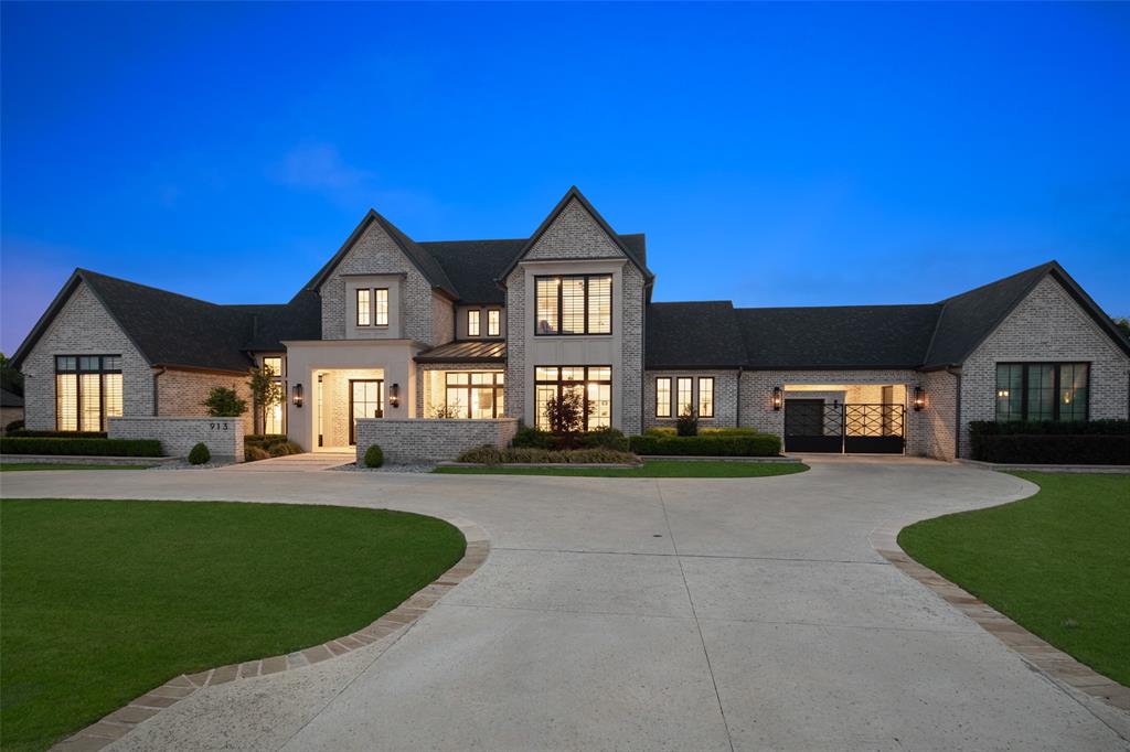Refined elegance, thoughtful design and timeless finishes are yours at
this beautiful home! This custom Tim Jackson home combines
everything you're looking for. The 1.5 story allows the majority of
the living area to be enjoyed on the 1st floor. Classic brick and cast
stone exterior with gas lanterns, circular drive and a gated motor court
greet you. Beautiful Office with built in leather granite stone desk, green
painted built ins and 2 seating areas. Primary Suite is connected to the
marble floored decked out Laundry Room and has a Dressing-Glam
Room w-built ins and LED mirror. Huge Primary Closet has overhead
storage accessed with rolling ladder, built in dresser island, jewelry
display case, shoe storage and mirrored dressing corner. Primary
Bathroom has oversized shower w-dual heads, standing tub +
chandelier, double vanities w-wood accented storage column, sconce
lighting and hideaway coffee bar-storage + cabinet front mini fridge.
Fantastic Entertaining and Chef’s Kitchen with 2 quartzite islands, white
and red wine custom fridges, Wolf Gas Cooktop + 2 ovens.
Scullery-Prep Kitchen behind main kitchen includes: ice maker, 2nd
dishwasher, warming drawer, banks of cabinets and display China
hutch. Craft-Storage Room + small tucked away desk and 2 pantries.
Wet Bar + Butler’s Pantry w-statement green tiled backsplash, ice
maker, Sub Zero mini fridge, fridge and freezer drawers. 1st Floor
Media Room. Great Half Bath. 2nd Floor is complete w-2 ensuite
Bedrooms, storage-built ins, decked mechanical room and separate huge
decked attic space that could be finished out. Outdoors you’ll find the
connected Gym and Casita w-patio+2nd private entrance. Incredible
patios including main off LR w-ceiling heaters & electric screens,
additional outdoor kitchen, grill, serving bar + Pool-Spa, fire pit and water features all
surrounded by tree lined backyard. Fantastic property for entertaining
and family gatherings. One-of-a-kind estate!  Live April 2