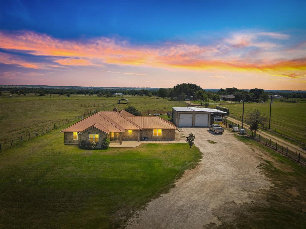 Stunning country estate on 9.07 acres, built in 2016! This 4-bedroom home (with dual primary suites) offers 3 full baths, gorgeous tile flooring, granite countertops, and stainless appliances. Enjoy a 30×40 insulated workshop with RV parking, metal roof, fireplace with blower, and outdoor kitchen hookups ready for entertaining. Features include spray-foam insulation, Ag exemption, and Moody ISD schools—all just minutes from Temple and Belton. The perfect blend of luxury, land, and lifestyle wrapped into one extraordinary package. Come see why this Dove Road estate is the definition of country luxe living! PROPERTY IS BOM DUE TO NO FAULT OF THE HOME, REPAIRS HAVE BEEN COMPLETED AND WE ARE READY TO CLOSE!! BRING US YOUR BEST OFFER! Tanja Allen with Fairway is offering 1% lender credit!