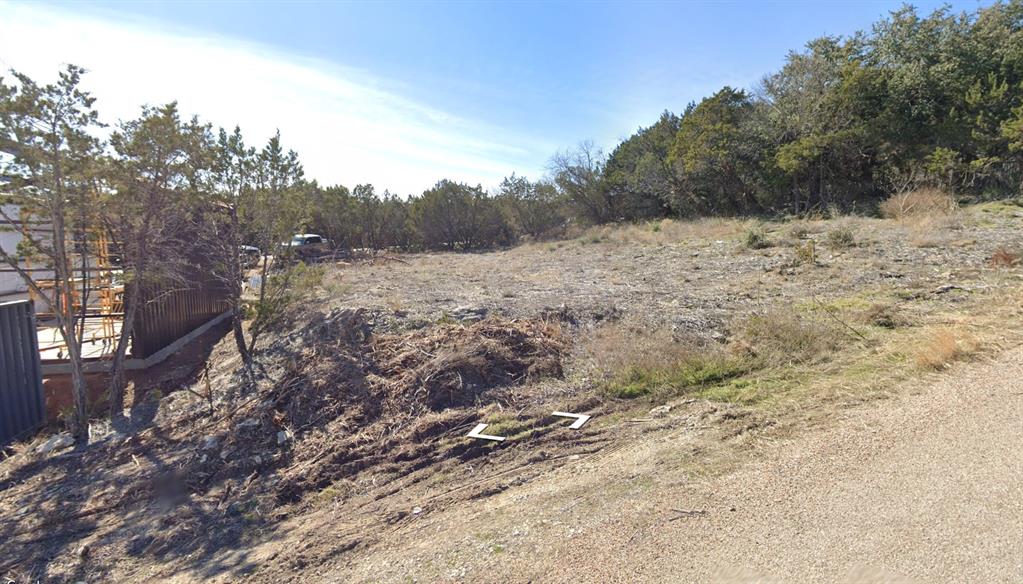 Build your dream home in the desirable Comanche Harbor Sec C community! This lot offers a rare opportunity to design and construct your ideal home in a peaceful, established neighborhood just minutes from Lake Granbury and downtown amenities. Situated on a quiet street, the parcel provides ample space for a custom residence—with room for outdoor living, landscaping, or recreational use. Residents enjoy access to community facilities including boat ramps, playgrounds, basketball and tennis courts while still being close to schools, shopping, and dining. Perfect for those seeking flexibility, this lot offers a great canvas for your next project. Don’t miss this chance to secure land in one of Granbury’s charming lake-area subdivisions!