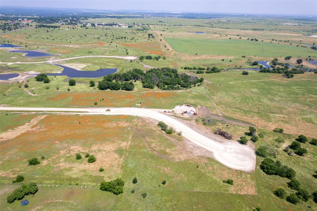 Come & build your dream home on this beautiful lot in the highly sought after Aledo ISD! Ideally located just 15 minutes to Fort Worth, 15 minutes to downtown Weatherford and 30 minutes to DFW Airport. This property offers a unique blend of natural landscapes with beautiful water features, rolling terrain, and various elevations, presenting a perfect canvas for your dream home. The property's topography provides a picturesque base for designing a home that fully utilizes the natural contours and panoramic views of the property. AT&T Internet being installed.  Propane tanks must be buried

With its proximity to both Fort Worth & Weatherford, you have the convenience of city amenities like shopping, dining, and entertainment just a short drive away, while still enjoying the tranquility and privacy that country living provides.

Lakeridge Ranches offers a rare blend of convenient location and natural beauty. Don’t miss this unique opportunity!!