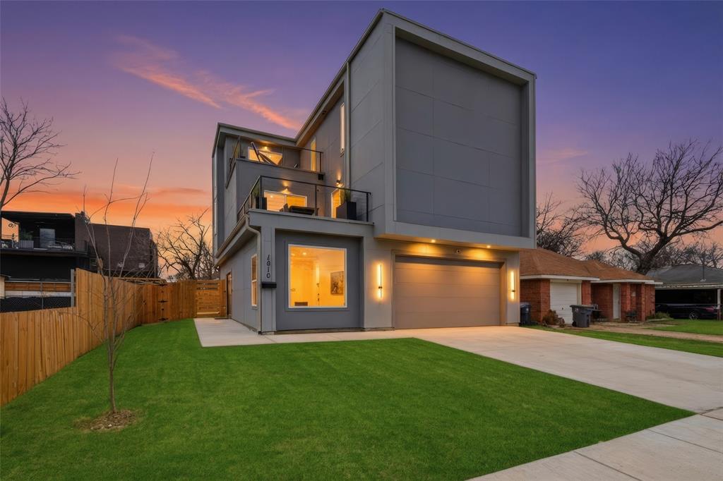 Welcome to 1810 Kraft Street! This one of a kind modern contemporary designed home with downtown views is nestled in Trinity Groves and just minutes away from American Airlines Center, Bishop Arts, and the Design District. Laminate flooring throughout the whole home! 2 secondary bedrooms and a bathroom are also on the first floor. The second floor is the heart of the home which boasts a stunning kitchen with a 14-foot granite waterfall island, equipped with state-of-the-art appliances, this kitchen is a chef's dream. Ample cabinetry and pantry space to ensure all your storage needs are met. The kitchen seamlessly connects to a bright living room with 18-foot ceilings and numerous windows, flooding the space with natural light, luxury lighting and a 70 inch fireplace. A charming balcony extends off the living room, and provides access to the 2nd floor guest bedroom. This floor also includes a well appointed full bathroom and a convenient laundry room. The primary retreat is on the 3rd level and is spacious and bright. It includes a cozy seating area for relaxation which could also be used as an office space, and opens to the balcony where you can enjoy even more great views of downtown! The luxurious ensuite bathroom has dual vanities, a modern free standing soaking tub, and a 2 sided shower offering a spa-like feel. This home is thoughtfully designed to accommodate a rooftop deck, providing an incredible opportunity for outdoor living and entertaining! A full water filtration system also is installed on the home, security system and alarm, new modern front door installed.