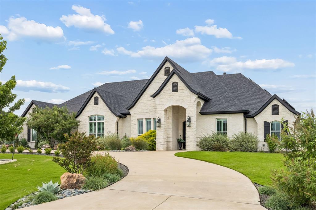 This luxurous 3462 sq ft  1 story home sits on 1 acre in a quiet country neighborhood. Meticulously well kept home featuring high ceilings, 4 bedrooms, 3 and a half baths and an oversized 3 car garage. Handscraped hardwood floors throughout the house with a large private office. A spacious living area with a cozy gas fireplace great for entertaining or just enjoying a quiet evening. Open concept kitchen with luxury finishes including quartzite countertop, high end appliances and double island. The private primary includes a spacious ensuite bath with dual vanities, a soaking tub, large walk-in shower, and a large walk-in closet. A multi-purpose room for entertainment or media room. Additional highlights include a screened in porch, sprinkler system and solar panels that are paid off.  No City Taxes! This home is MOVE IN READY! COME SEE IT TODAY! IF THE BUYER DOES NOT WANT THE POOL, THE CURRENT OWNER WILL REMOVE IT PRIOR TO CLOSING.