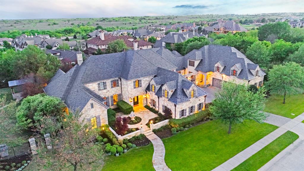 One of a kind sprawling estate located on approximately 1.6 acre lot in gated Montserrat. This private estate boasts every amenity a discerning buyer would desire including, Salt water pool, spectacular Sport Court, Pool House, outdoor Kitchen, and a Putting Green. The gourmet Kitchen includes top of the line professional grade appliances- Sub-Zero Thermador and Kitchen-Aid. Travertine and oak wood flooring throughout, spacious Master suite with coffee bar plus secondary Master also located on the first floor. Large Game Room with wet bar, Theatre Room, Craft Room, and two 3 car Garages. Truly unique opportunity in prestigious Montserrat! See property amenities list in MLS docs, and don't miss the Virtual Tour! NEW SLATE ROOF AND NEW GUTTERS ARE IN PROCESS! A $388K VALUE TO BE PASSED TO A BUYER!