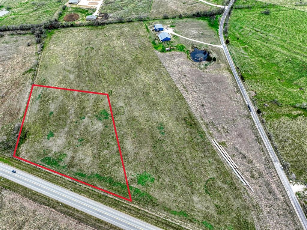 This beautiful 5.0 acre property sits on State Highway 34 just off Alsdorf Rd, with approximately 475' of frontage. Perfect location to build your dream home! Rural setting with plenty of space to spread out and create your ideal homestead, this property combines country living with convenience. Easy access to I-45, restaurants, shopping, a good mix of old and new residential properties and new businesses coming to the rapidly growing community of Ennis. Property is currently being used for hay production and is well maintained. The lot slope would allow for a future pond. Deed restrictions.