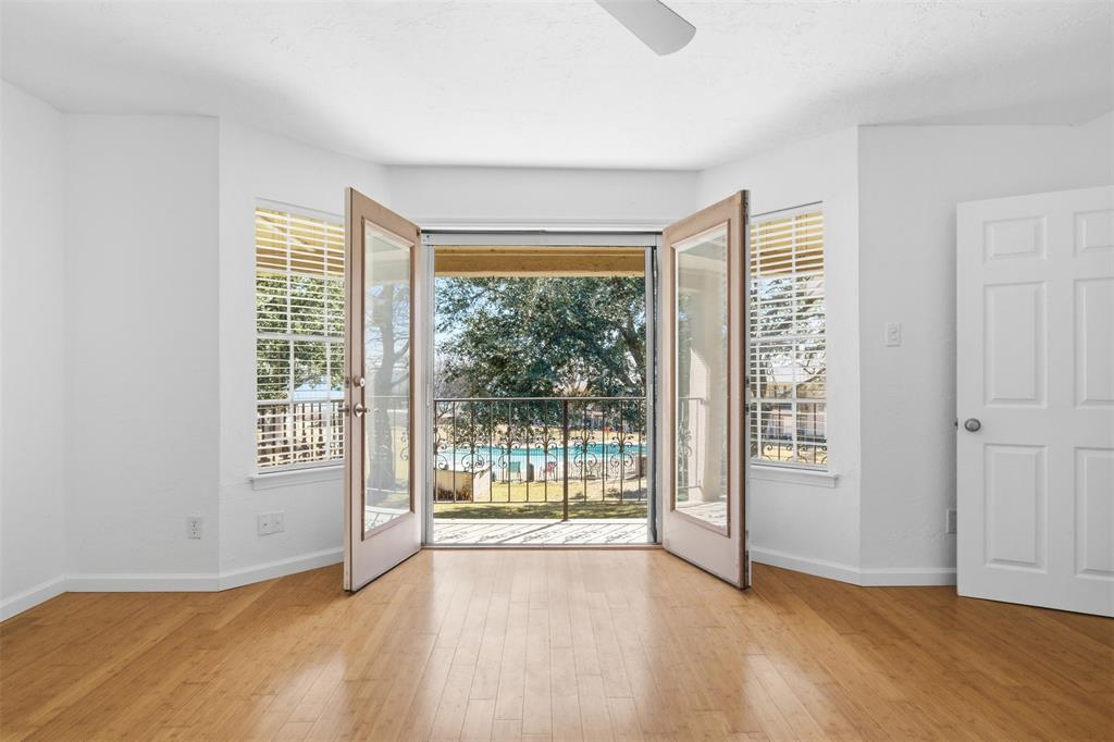 PERFECT INVESTMENT FOR YOUR NEXT RENTAL PROPERTY!
Wake up to beautiful views of Lake Ray Hubbard in this spacious and thoughtfully updated condo located in the desirable Captains Quarters community. Offering approximately 1,800 square feet, this 2-bedroom, 2.5-bath home combines modern updates with a unique waterfront lifestyle.
The open-concept floor plan features an updated kitchen with a brand-new stove, generous living and dining spaces, and large windows that bring in natural light and showcase the lake views. Upstairs, you'll find beautiful bamboo flooring and two spacious bedrooms, including a secondary bedroom with its own private balcony overlooking the water—perfect for enjoying your morning coffee or unwinding at sunset.
One of the home's standout features is the custom designer fireplace, creating a striking focal point in the living area with stacked stone, steel accents, and integrated lighting. Additional updates and custom touches throughout the home give it a distinctive character rarely found in rental properties.
Enjoy peaceful lakeside living while your HOA covers exterior insurance, water and trash. With convenient access to dining, shopping, major highways, and everything Lake Ray Hubbard has to offer. If you're looking for a move-in ready home with space, style, and incredible views, this is one you won't want to miss.