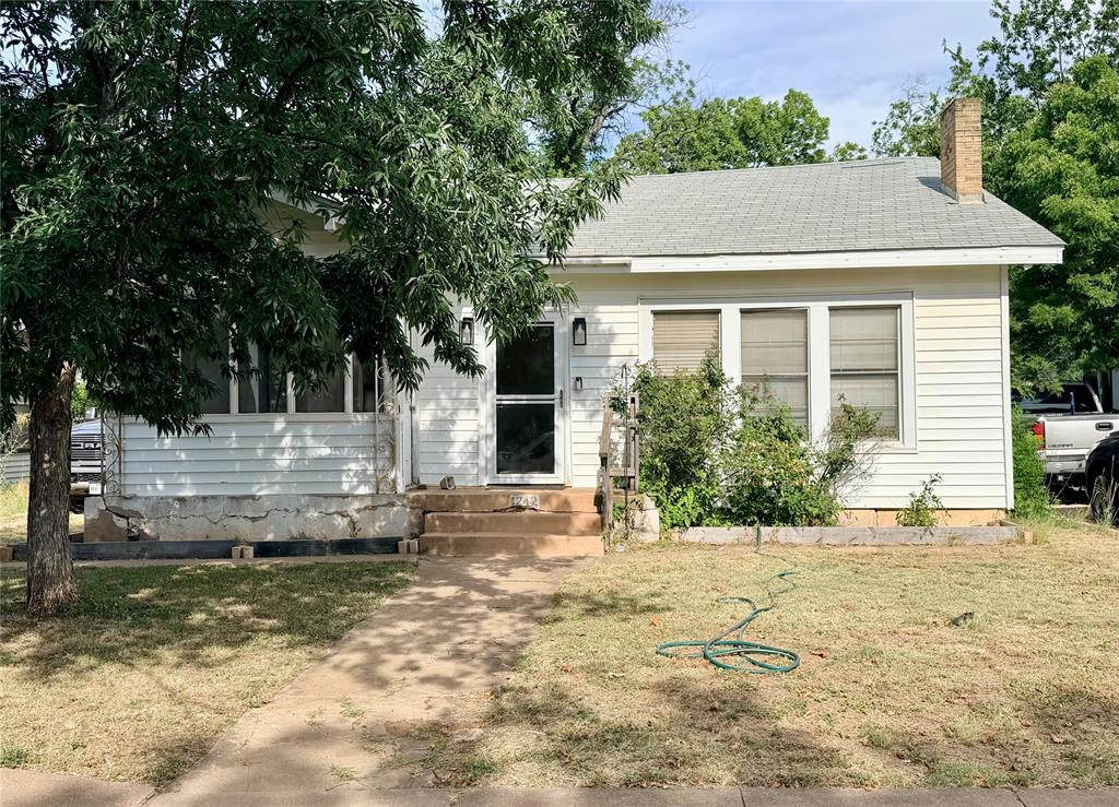 INVESTORS here you go. This house can fit rental needs, college students, or someone that wants to have a project. The main house is a two bedroom one bath with updated plumbing and wiring. This home has a detached garage that has been converted into an apartment! This house has old school charm with tall ceilings and plenty of back yard. You will not want to miss this one call for your showing