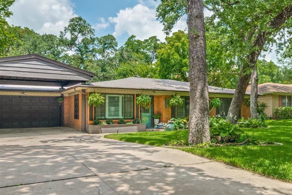 Welcome home to this beautifully updated 4-bedroom, 3-bath residence that perfectly blends timeless charm with modern convenience. Designed with flexibility in mind, the home features two spacious en-suite bedrooms, making it ideal for multi-generational living, guests, or a private home office retreat. The updated kitchen is the heart of the home, showcasing new appliances and a layout that is both functional and inviting. All three bathrooms have been tastefully renovated, including one featuring a luxurious Hollywood-style soaking tub. The primary suites in the back of the home offers private access to the backyard through french doors, creating the perfect spot to enjoy your morning coffee or unwind at the end of the day. Character abounds with original hardwood floors complemented by classic parquet flooring in the addition, while plantation shutters and new windows add style, energy efficiency, and abundant natural light throughout. Charming window boxes along the front of the home enhance its curb appeal. Step outside to your own backyard retreat featuring a covered deck with ceiling fans, perfect for relaxing or entertaining year-round. The front and back yards have been professionally landscaped with beautiful perennial plants, creating a lush, low-maintenance outdoor space where all you need to do is mow. With thoughtful updates, flexible living spaces, and exceptional outdoor amenities, this move-in ready home is one you won't want to miss. Refrigerator to convey with acceptable offer.