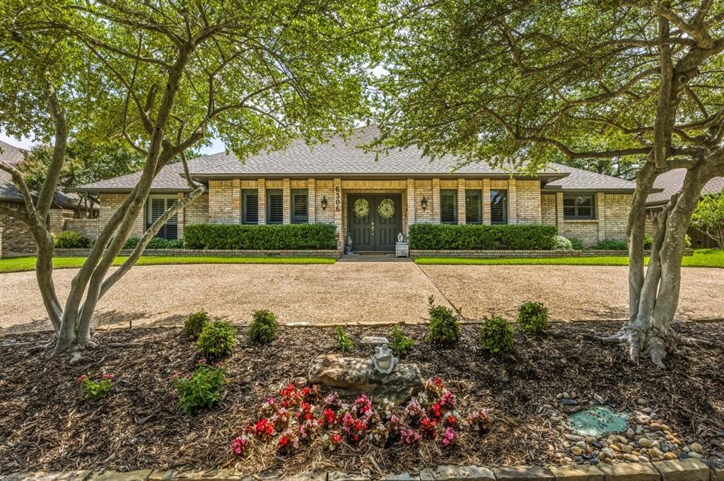 Set on a quarter-acre lot in sought-after Prestonwood, this light-filled ranch blends timeless charm with generous living spaces designed for everyday comfort and effortless entertaining. A welcoming formal entry opens to an expansive living room anchored by a striking stone fireplace, flowing seamlessly into the formal dining room for easy hosting.

At the heart of the home, the oversized kitchen offers abundant cabinetry, double ovens, a built-in cooktop, breakfast bar seating, and a sunny breakfast area overlooking the backyard. Just beyond, a cozy family room creates the perfect gathering space, while a bright sunroom invites year-round enjoyment with views of the pool and outdoor living areas.

The spacious primary retreat features a sitting area and a well-appointed ensuite bath with dual vanities, separate tub and shower, dual walk-in closets, and a private water closet. Three additional bedrooms provide excellent storage and flexibility for family, guests, or a home office.

Outside, a sparkling pool and multiple outdoor living spaces create a private backyard oasis ideal for enjoying warm Texas days and evenings. A charming brick façade, welcoming front porch, and mature setting complete this exceptional opportunity in one of North Dallas' most established and desirable neighborhoods.